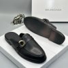 Balenciaga Black Leather Mules with Metallic Hardware