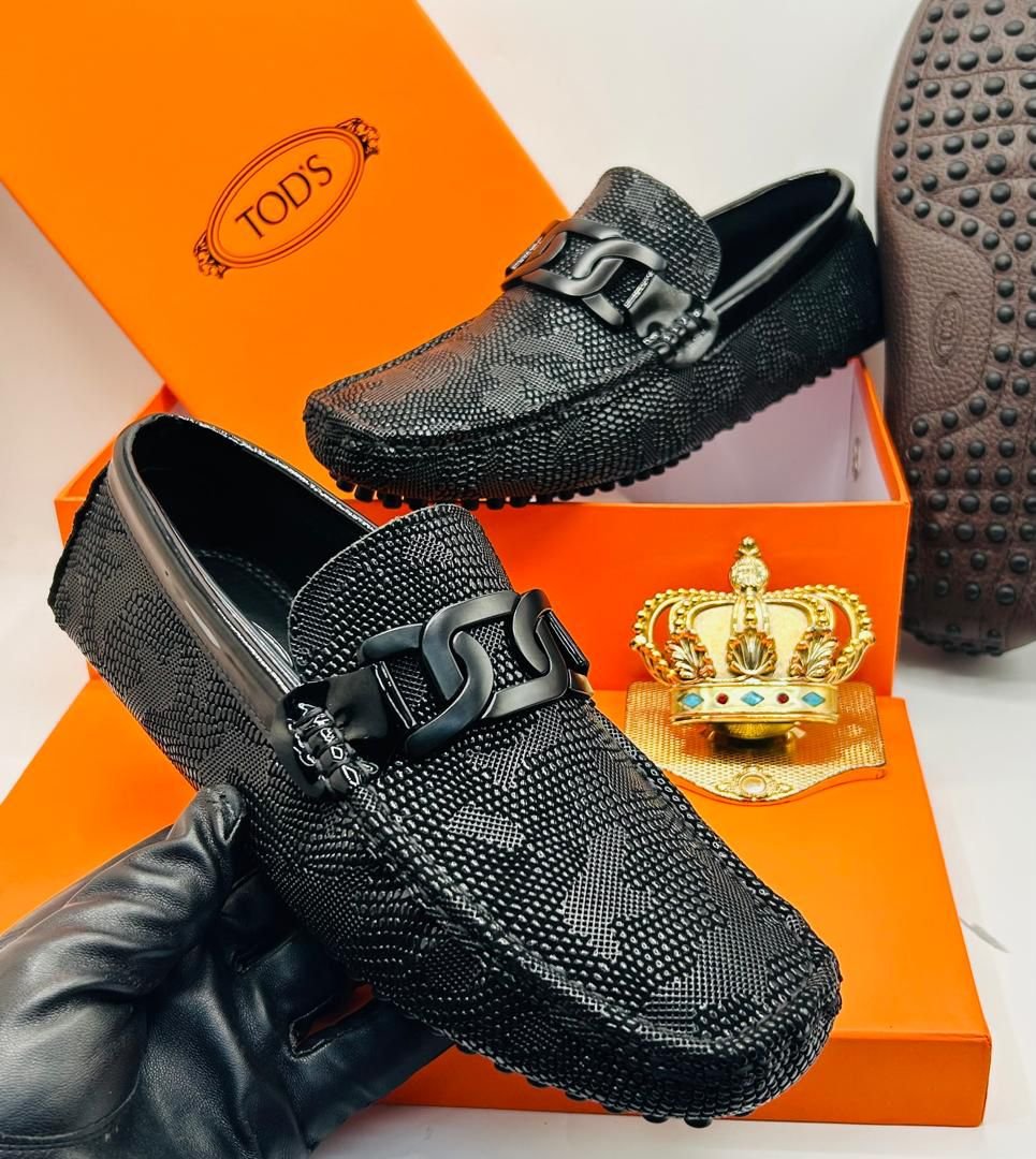 Tod’s Croc-Leather Loafers