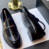 Black patent leather loafers